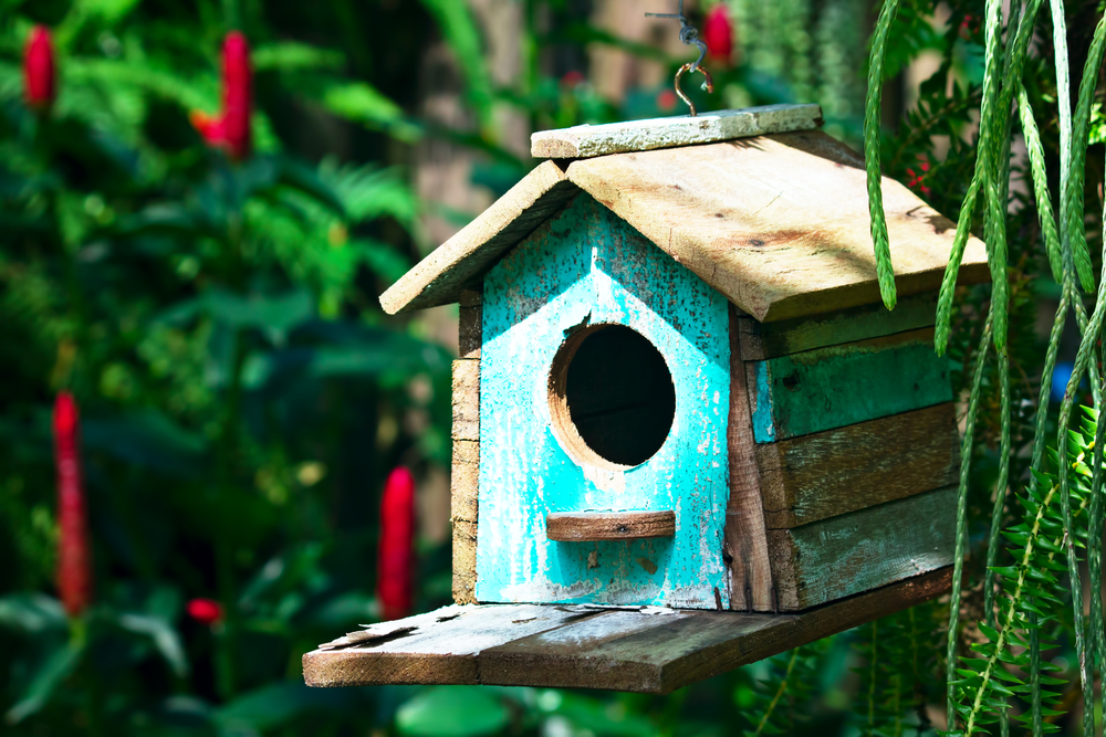 A blue bird house.