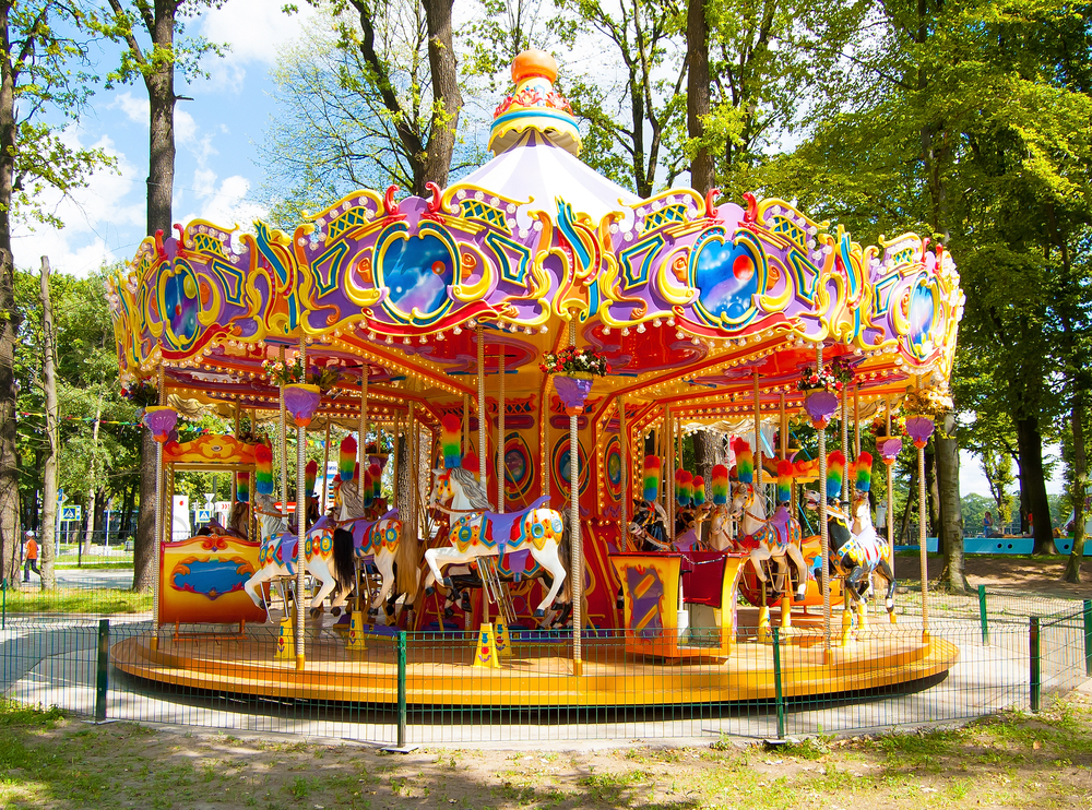 Colourful carousel in the park.