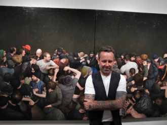 Dan Witz with one of his pieces of art
