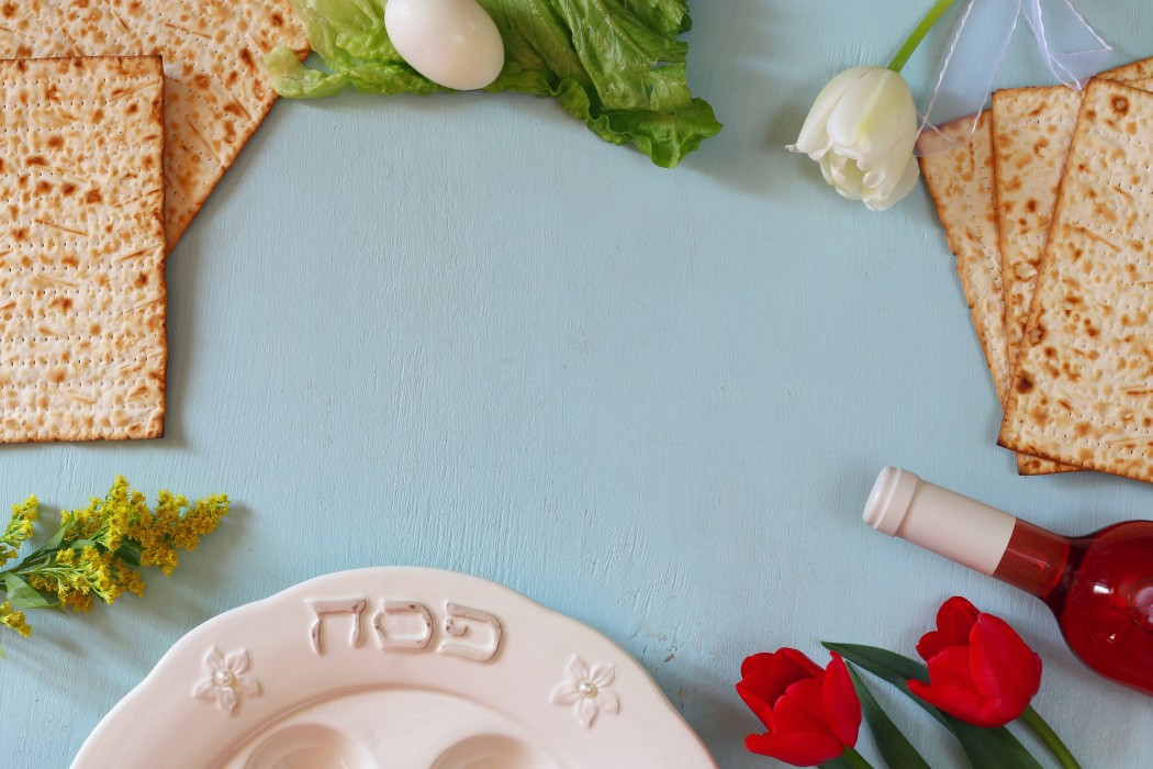 Passover goodies like matzo, egg, Seder plate, kosher wine