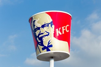 A sign of a bucket of KFC.