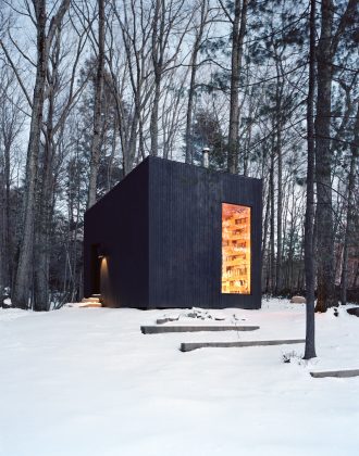 Studio Padron designed a cozy secluded library and sleep quarters in a forest in New York state.
