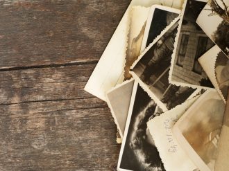 Vintage photos with wooden background.