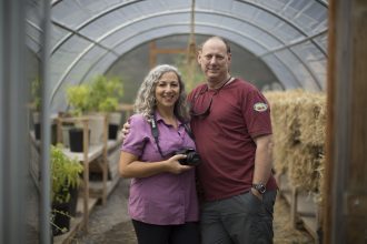Arlene Hazzan Green and Marc Green in their vegetable garden